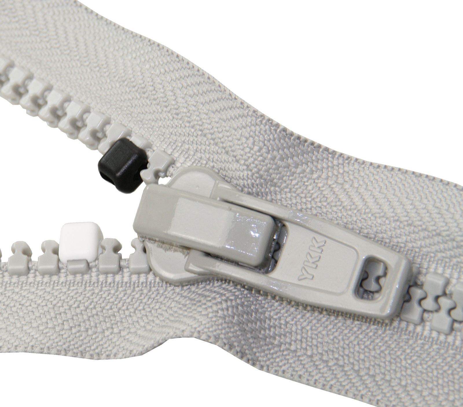 YKK stoppers for toothed zippers, size 10, plastic, white, 10 pieces. 1 YKK stoppers for toothed zippers, size 10, plastic, white, 10 pieces.